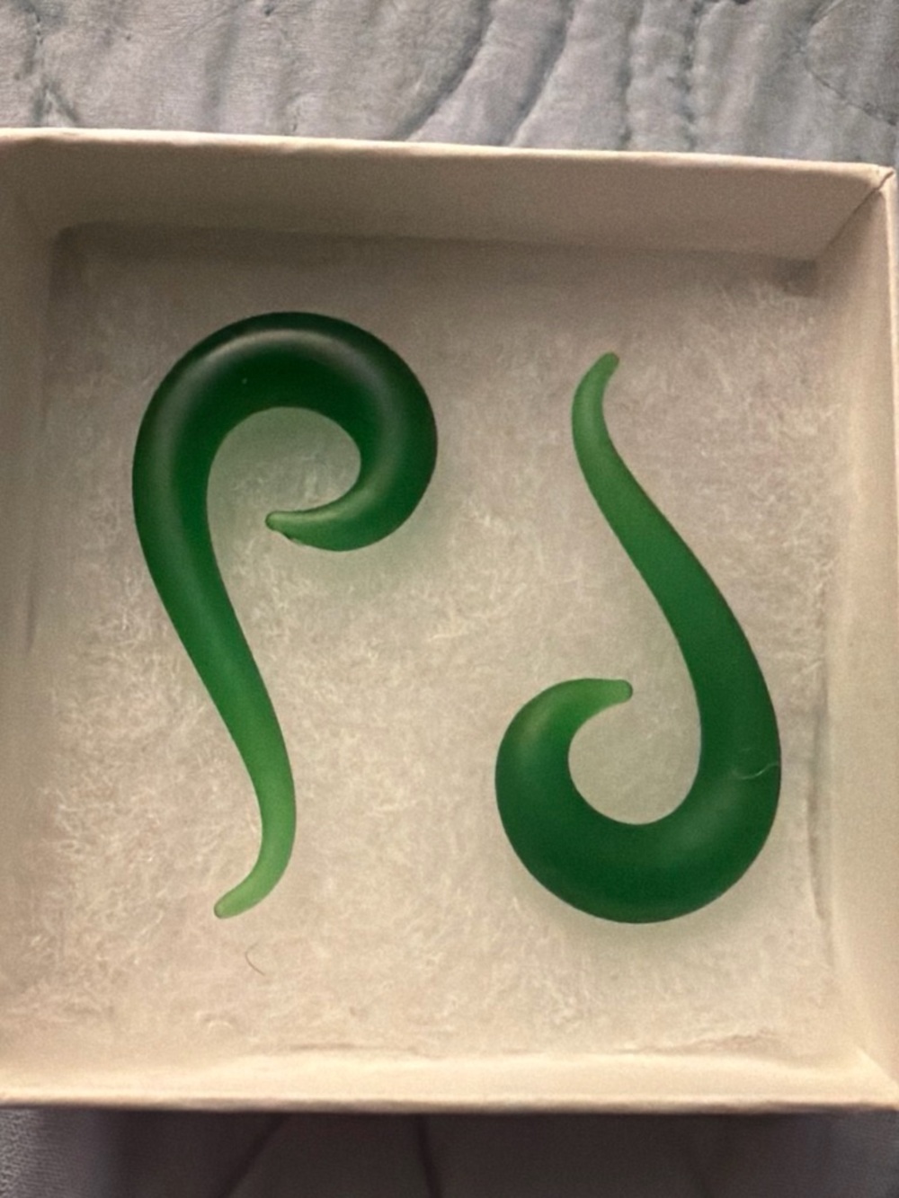 Spencer's Matte Green Spiral Hook tapers 0 gauge tempered glass
